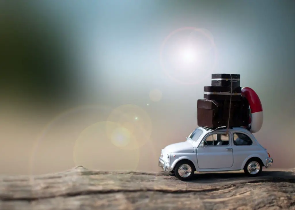 toy car with suitcases stacked on top